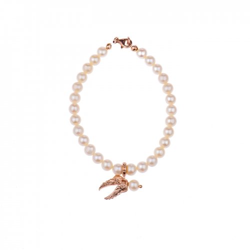 Rose gold plated sterling silver bracelet  with fresh water pearls.
