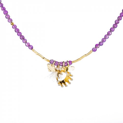 Necklace with amethyst beads and yellow gold plated sterling silver charms.